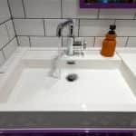 Washbasin with tap and handwash bottle - Bromley bathrooms by Jikka