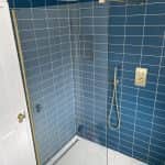 Bathroom's shower area by Jikka - Bathroom fitters Bromley