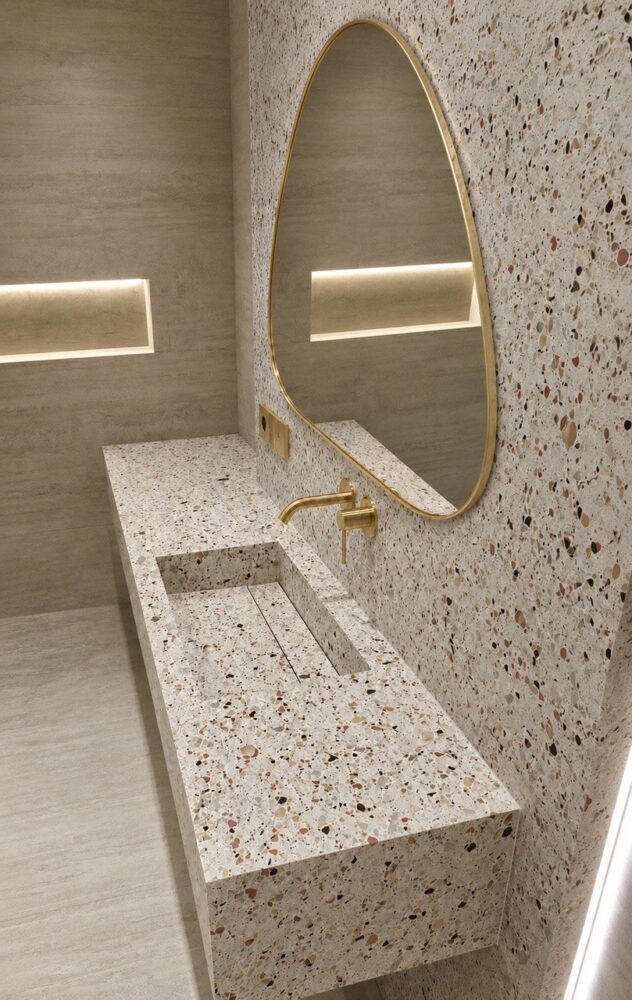 Custom-made terrazzo basin with brass tap, built by Jikka for a Bromley bathroom